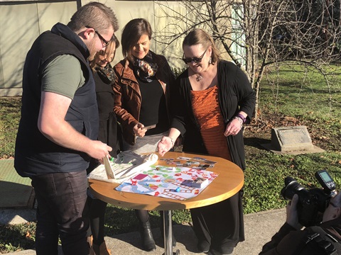 Scotsburn Fire Game with community recovery committee members